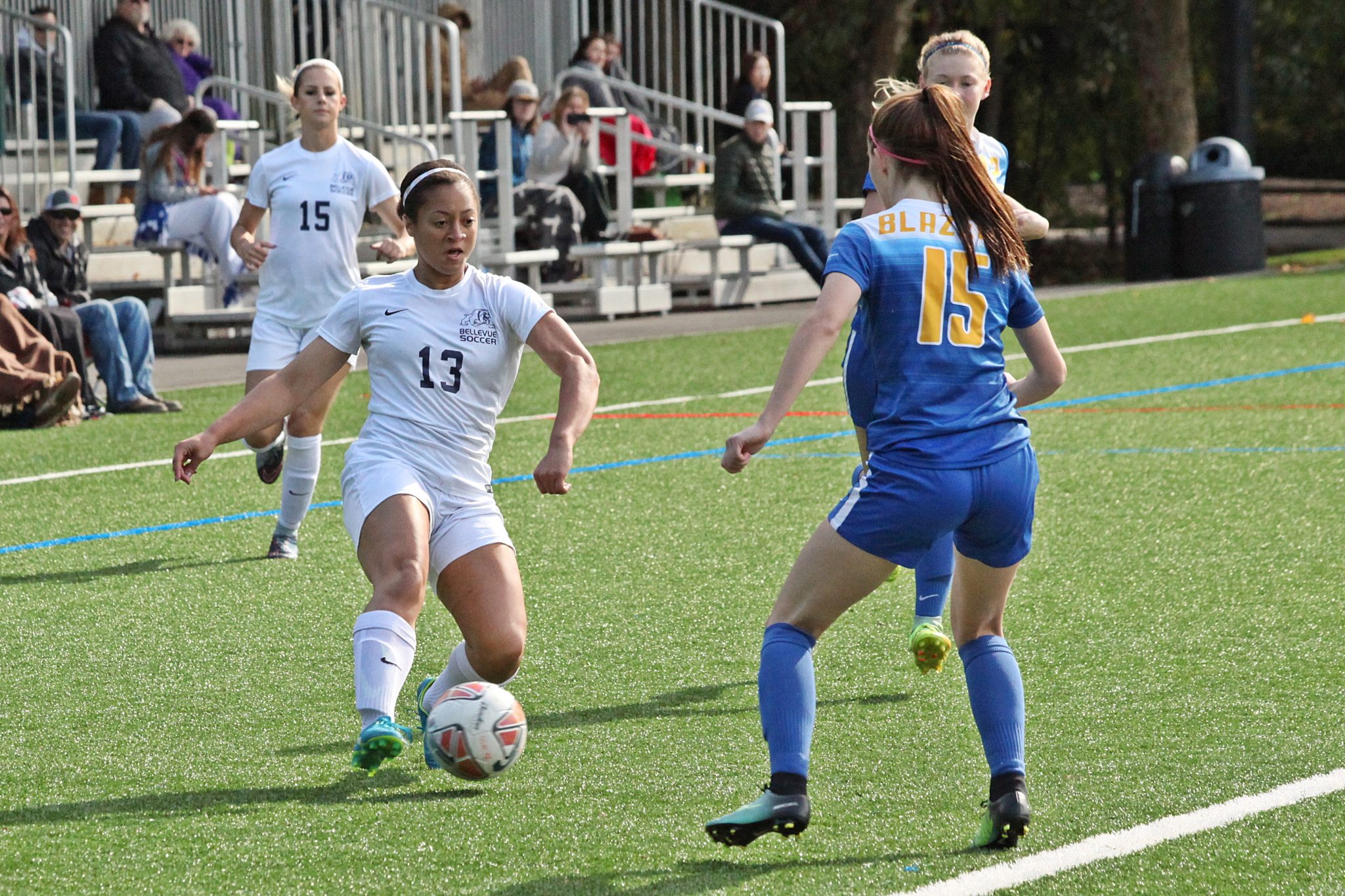 A BC player with the ball tries to get past a defender