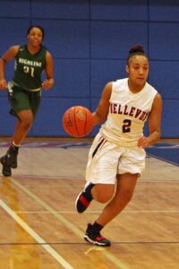 BC women's basketball player Sierra Cole dribbles the ball up the court