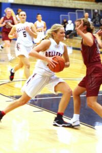 BC women's basketball plalyer Molly Dixon drives against a defender