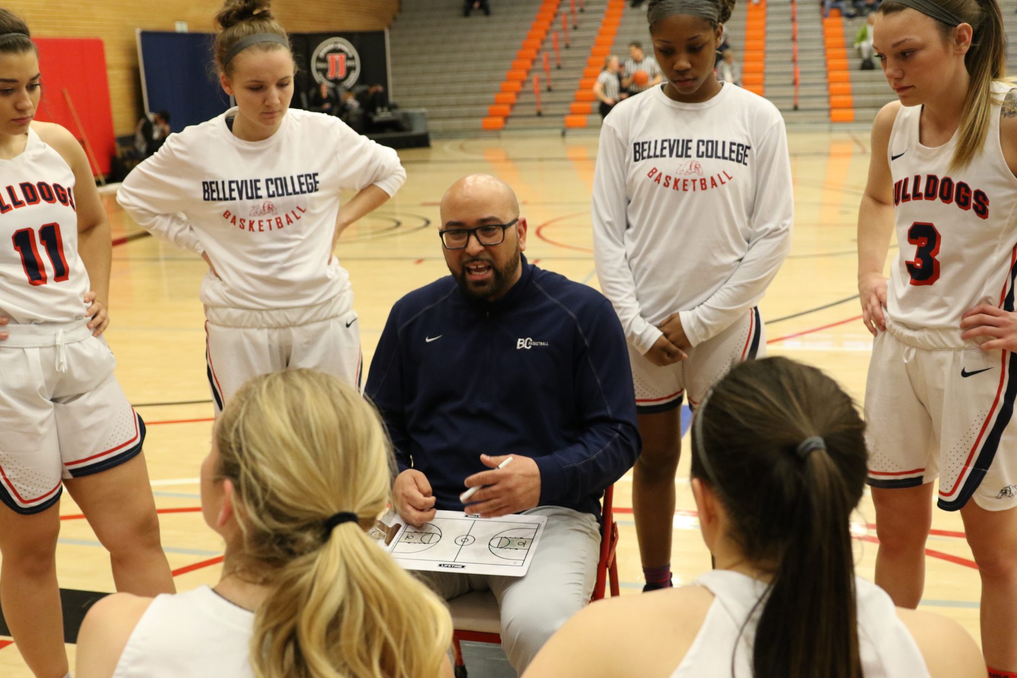 BC coach Mel Stubblefield talks to his players