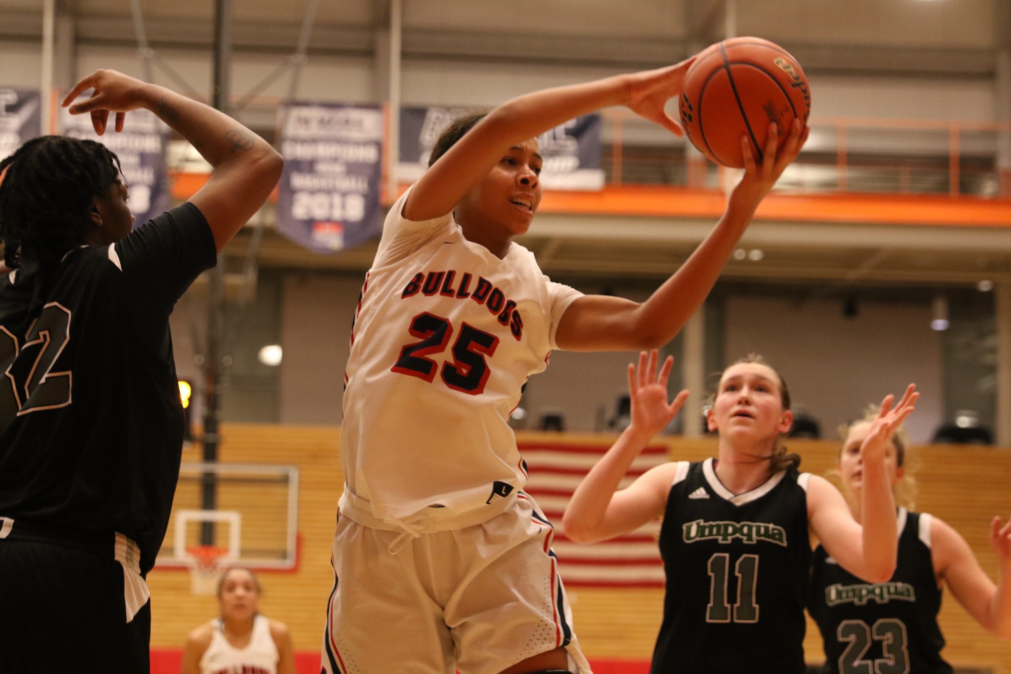 A BC player grabs a rebound