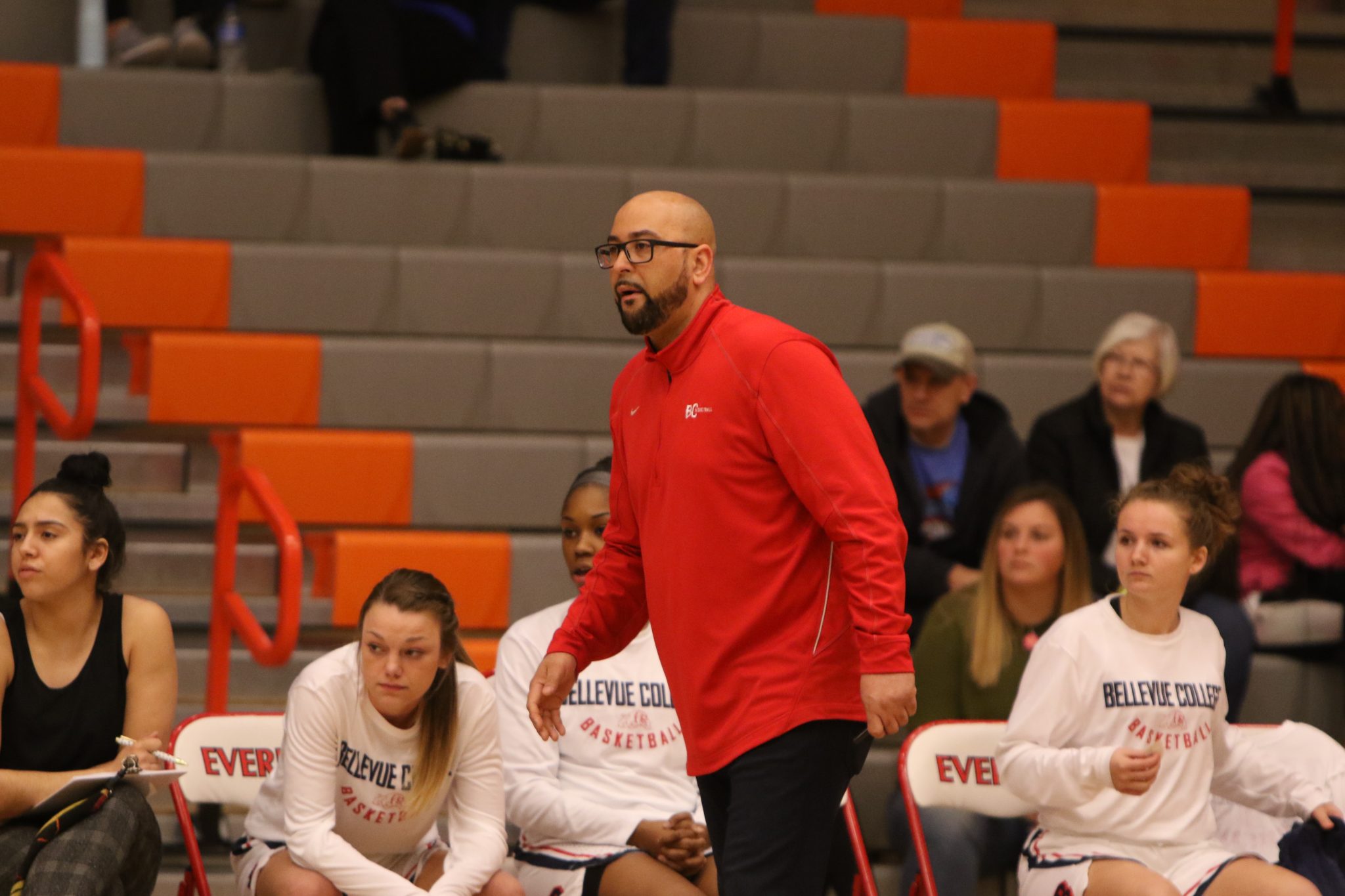 BC women's basketball coach Mel Stubblefield paces in front of the bench
