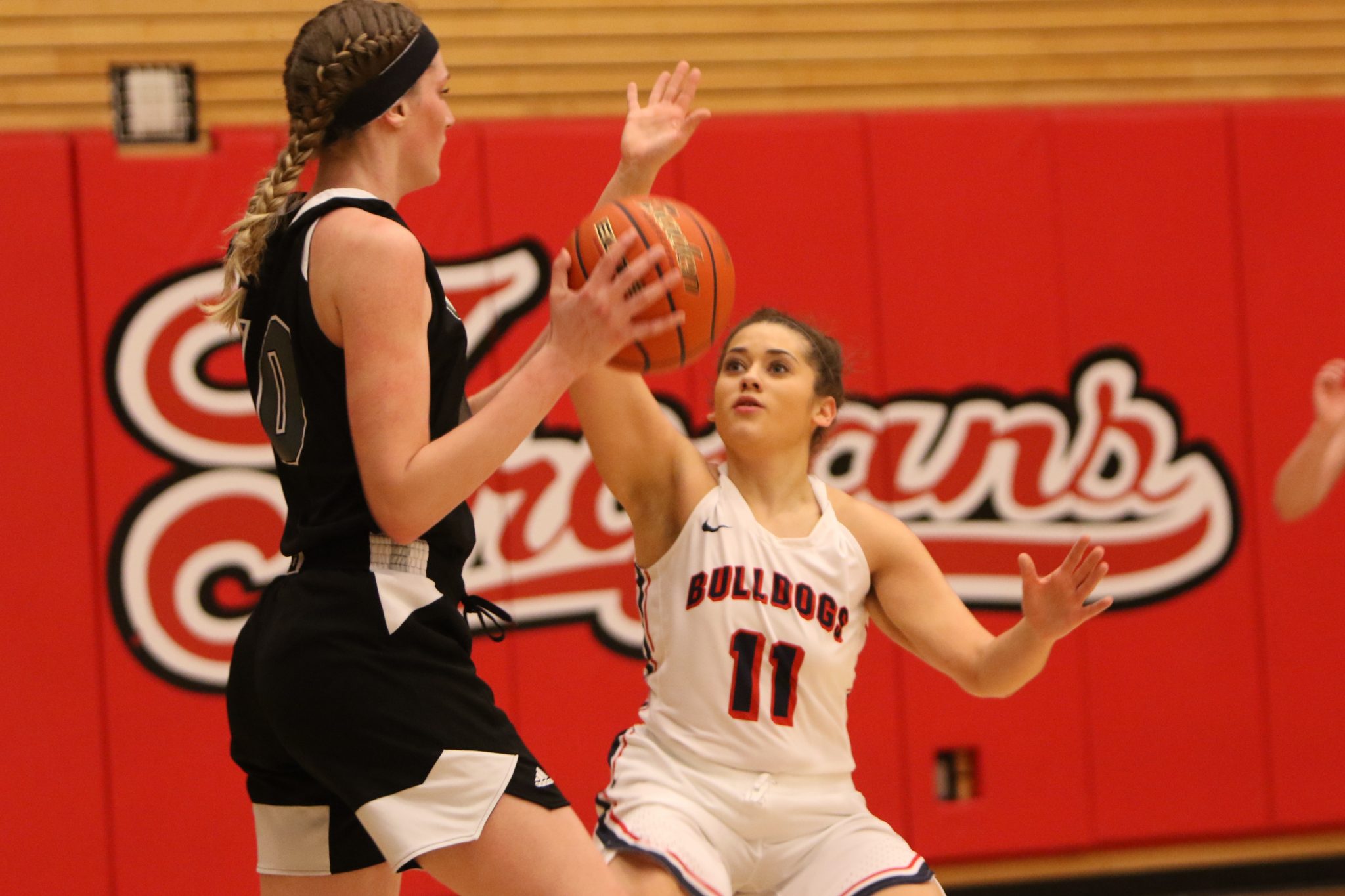 A BC player defends against an opponent