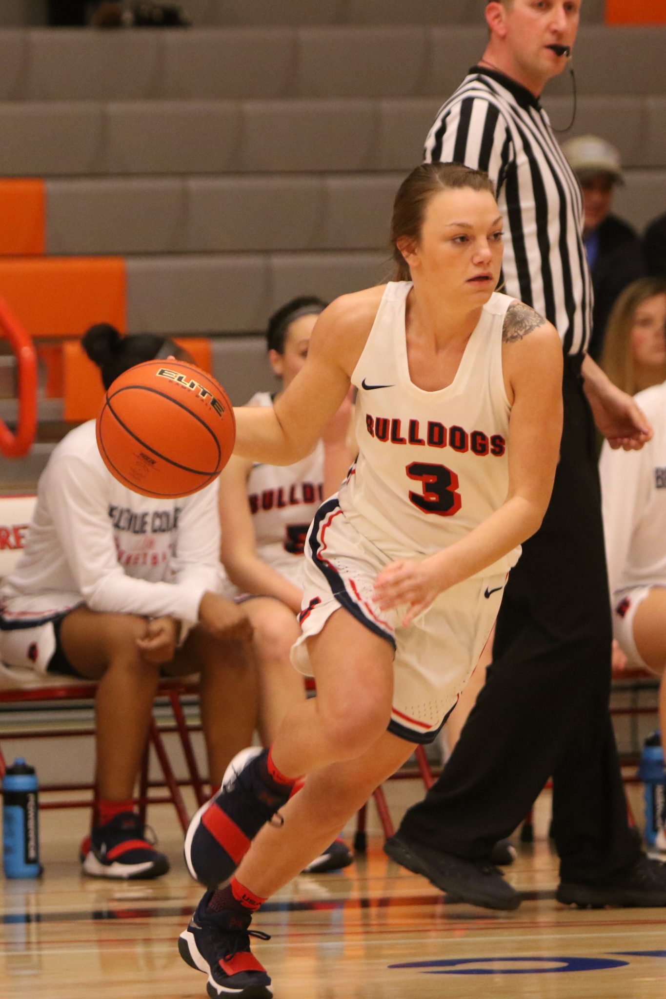 A BC player dribbles past a defender