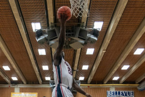 Malik Sanchez drives for a layup