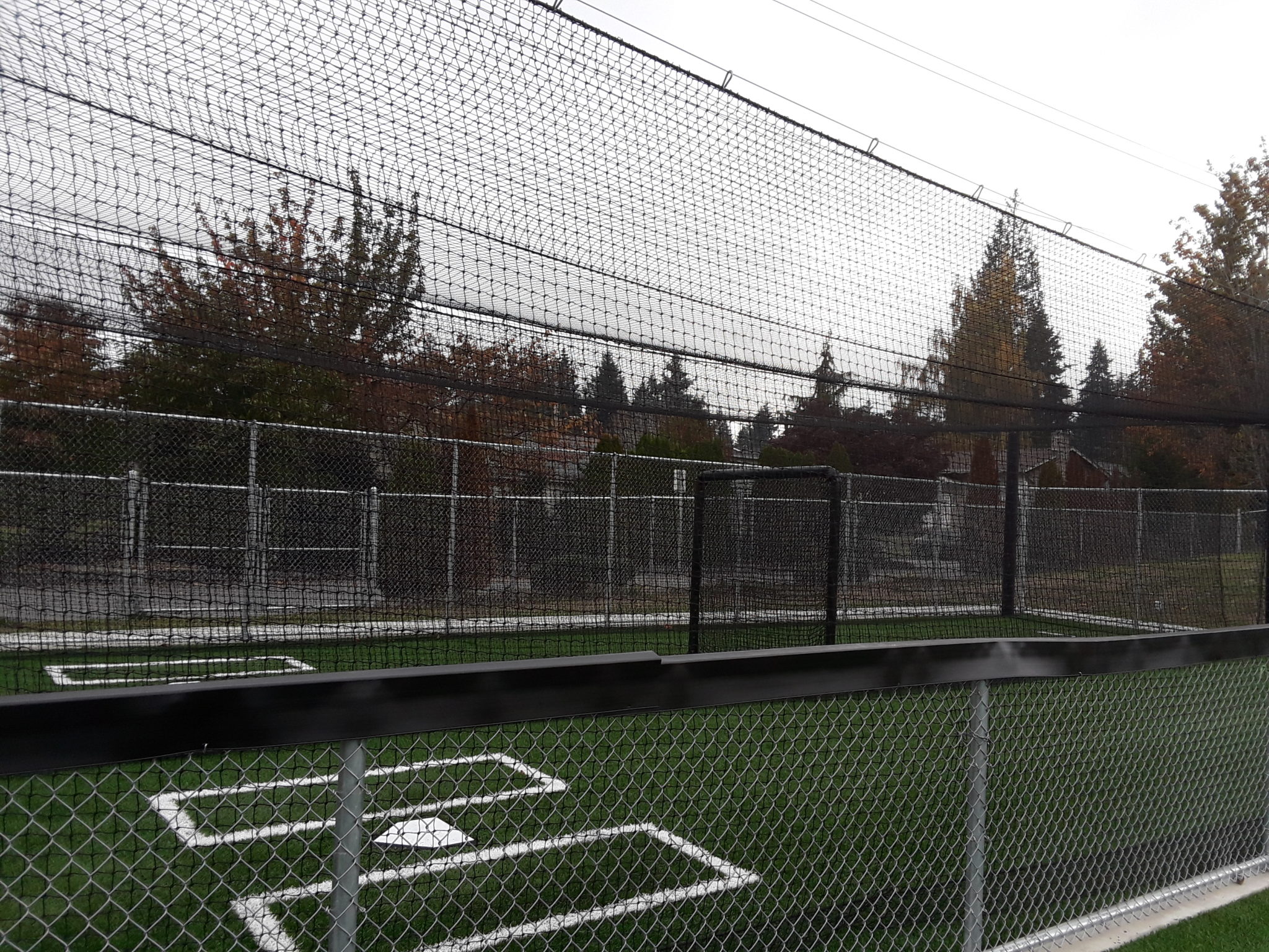 Softball field warm-up area and turf markings