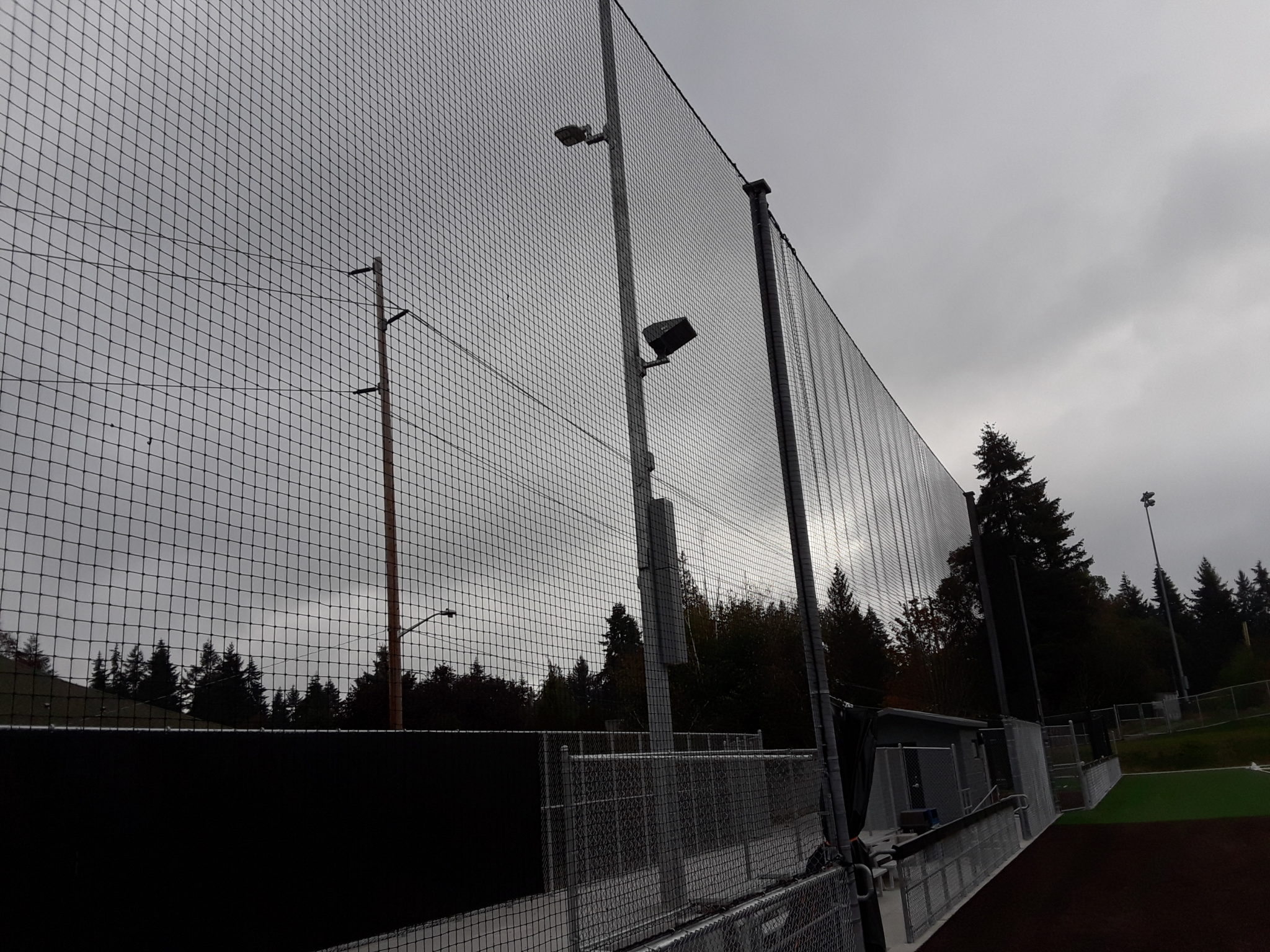 Softball field high netting