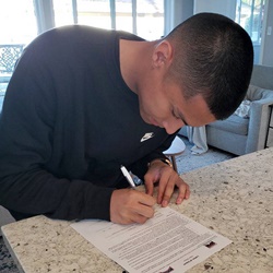 Parker Manalo signing a letter of intent