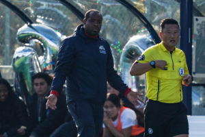 Richard Romain Dika Women's Soccer Coach