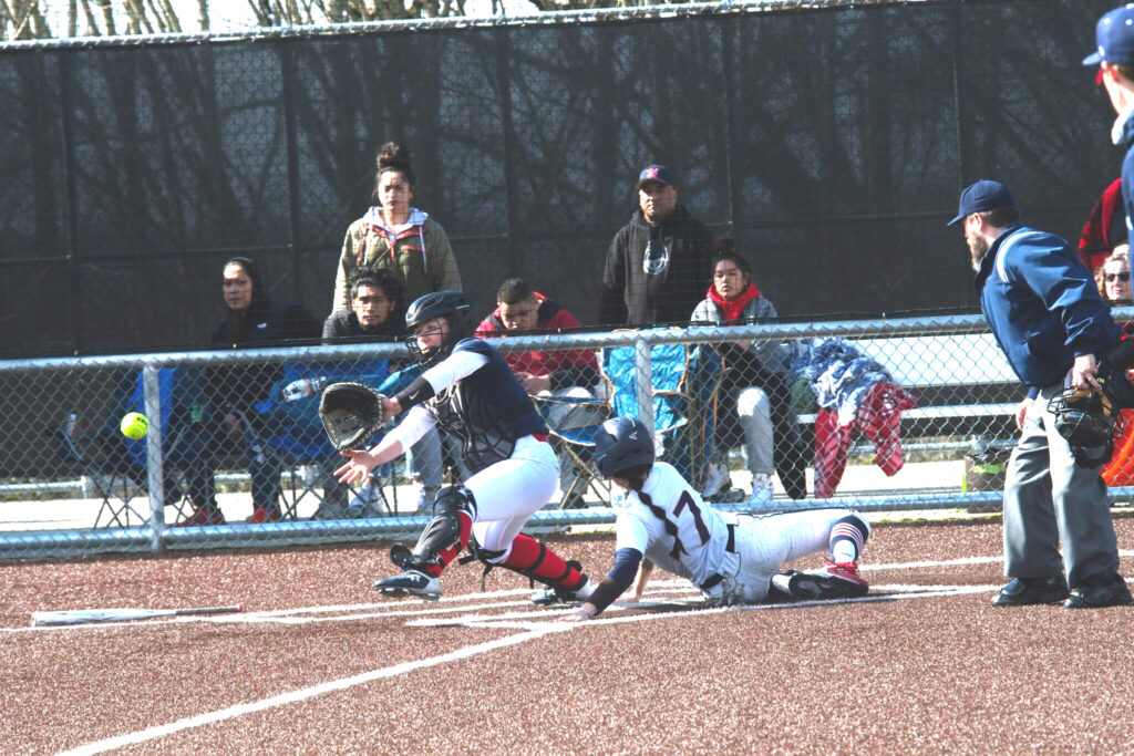 Taylor Wong slides home