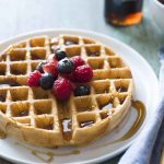 Golden Brown Waffles with fruit and syrup