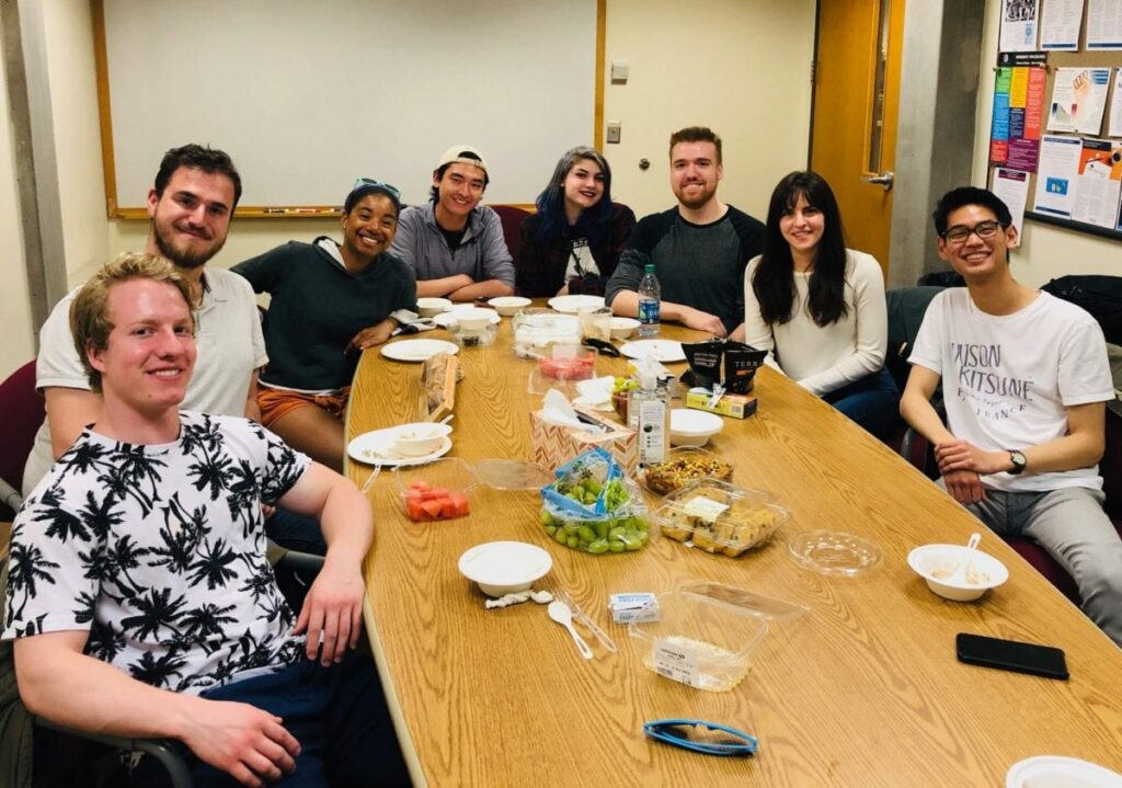 Students in psych club sitting around a table.