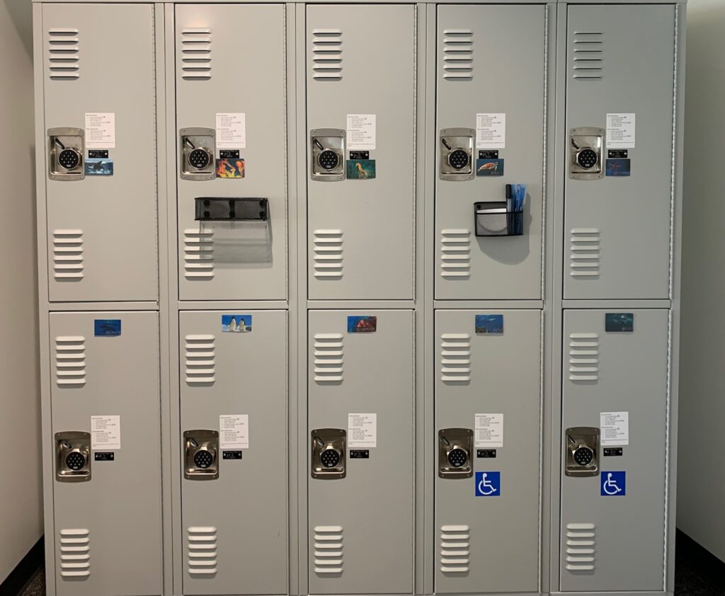 A picture of a set of lockers outside of the testing center. The lockers are in the lobby of U001, and can be locked with a custom pin. 