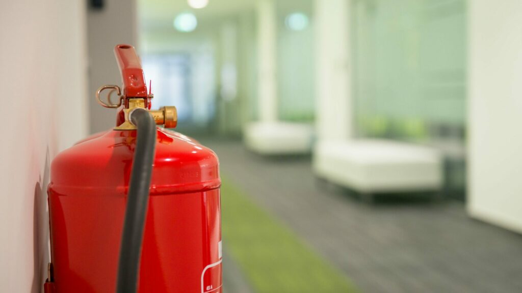 Close up of a red fire extinguisher