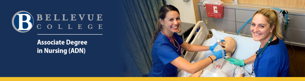 Two female nurses in a simulated nursing lab.