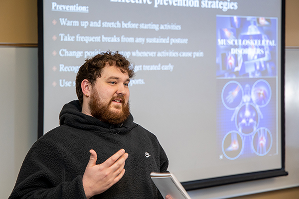 A Bellevue College student delivers a presentation.
