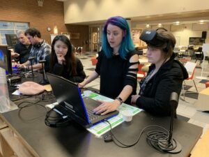 Three students in Virtual Reality Class