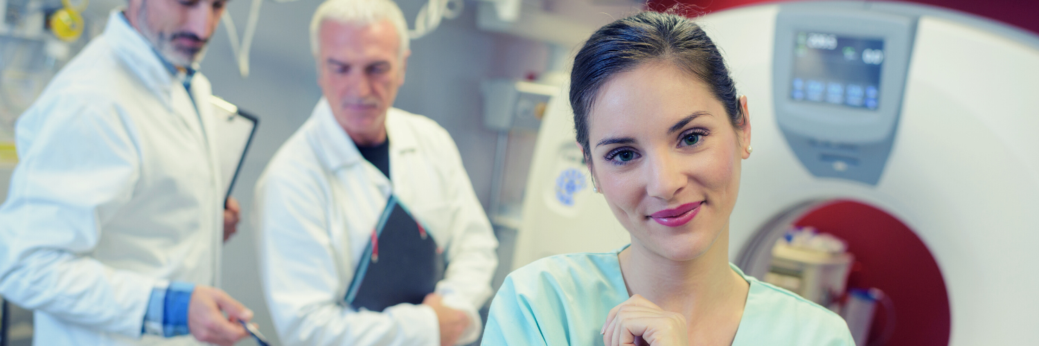 woman in front of CT machine