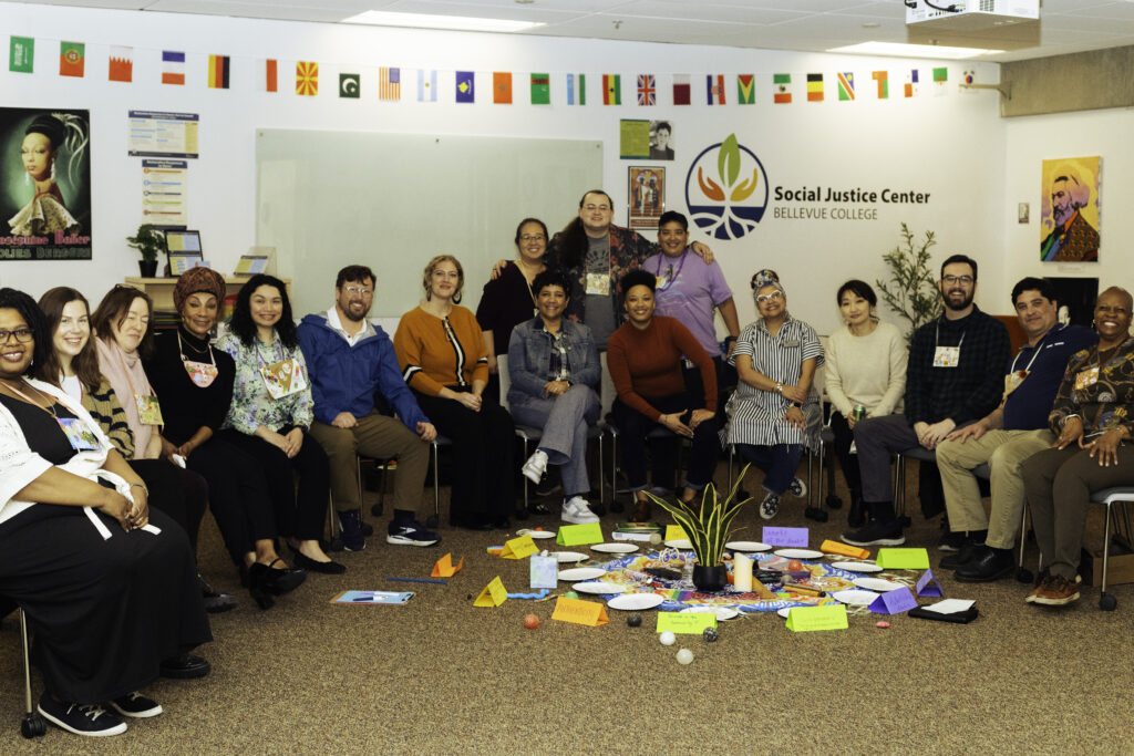 Group photo of various Bellevue College staff in the Social Justice Center.