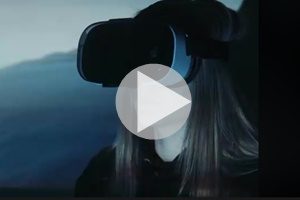 Person wearing virtual reality goggles - Links to video