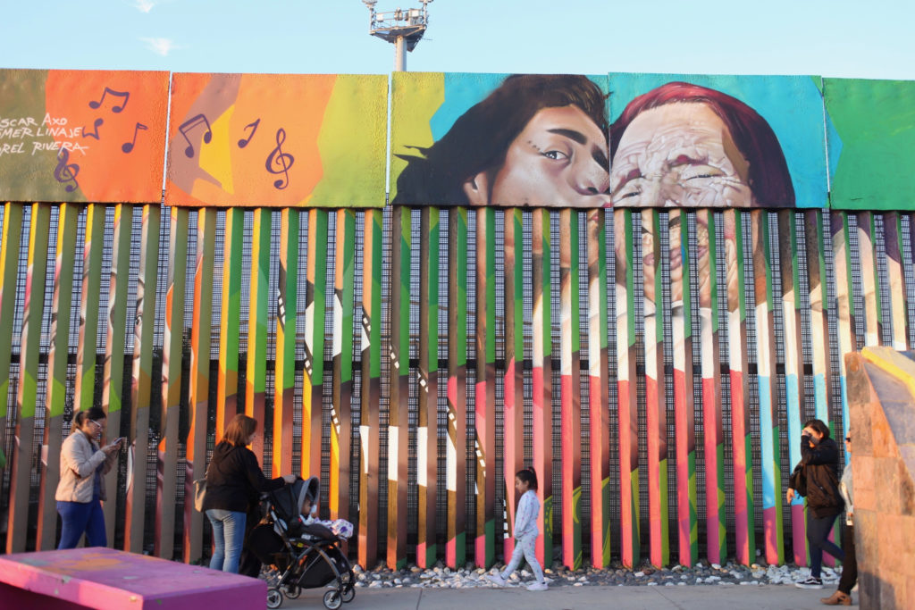 Mural behind the border wall