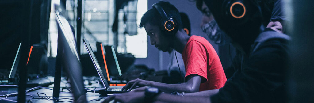 A student works on a coding project in the computer lab.