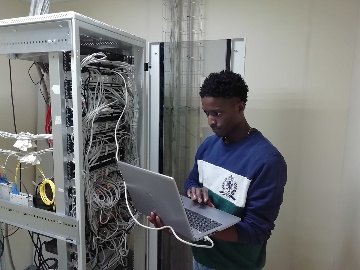 A student plugs in to test his computer.