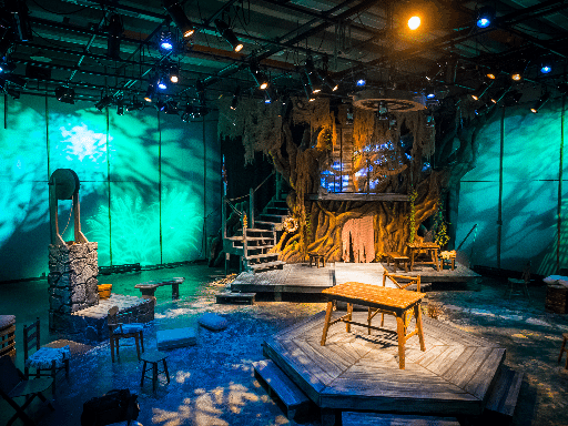 The Admirable Crichton stage set scene with a huge looking tree as part of the set