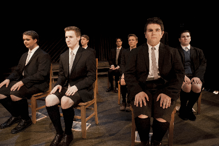 Spring Awakening ...men characters sitting in chairs