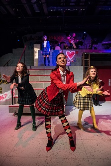 Four teenage girls on stage