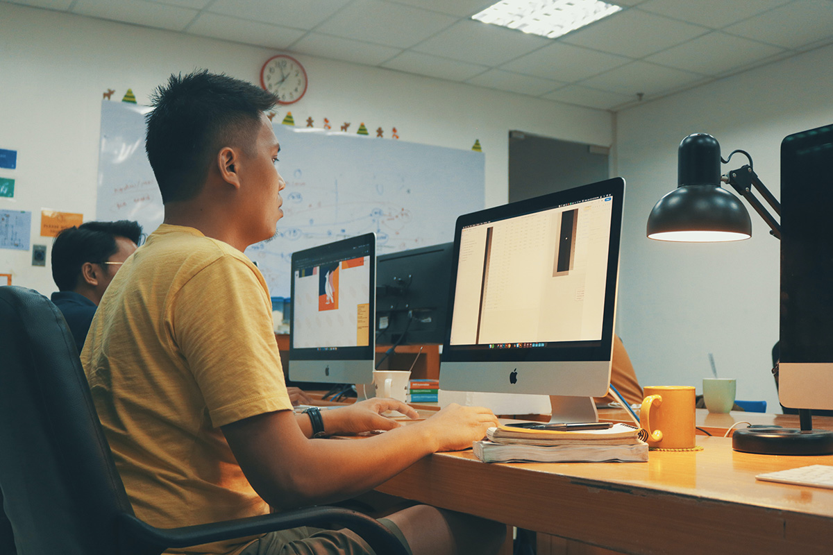 Students work on designs in the computer lab.