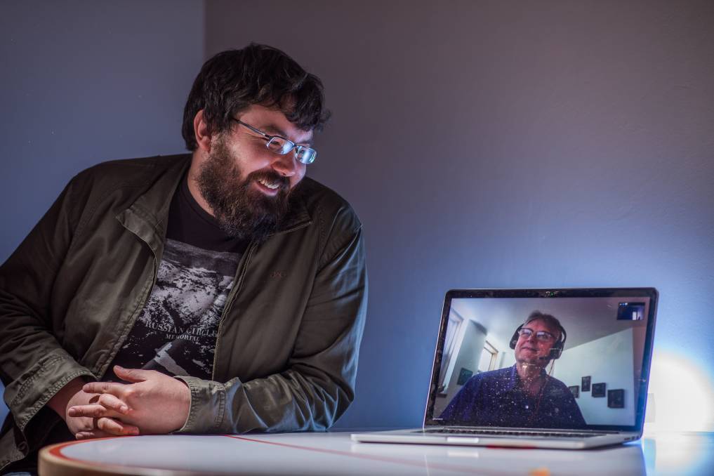 Professors James Riggall (left) and Bruce Wolcott (right) showing within a computer screen.