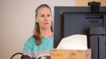 Instructor working at the computer