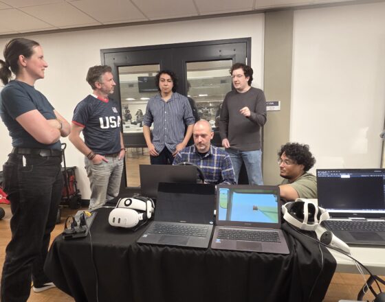 XR students at a Bellevue College annual Making Learning Visible event. The students are showcasing their XR driver simulation.